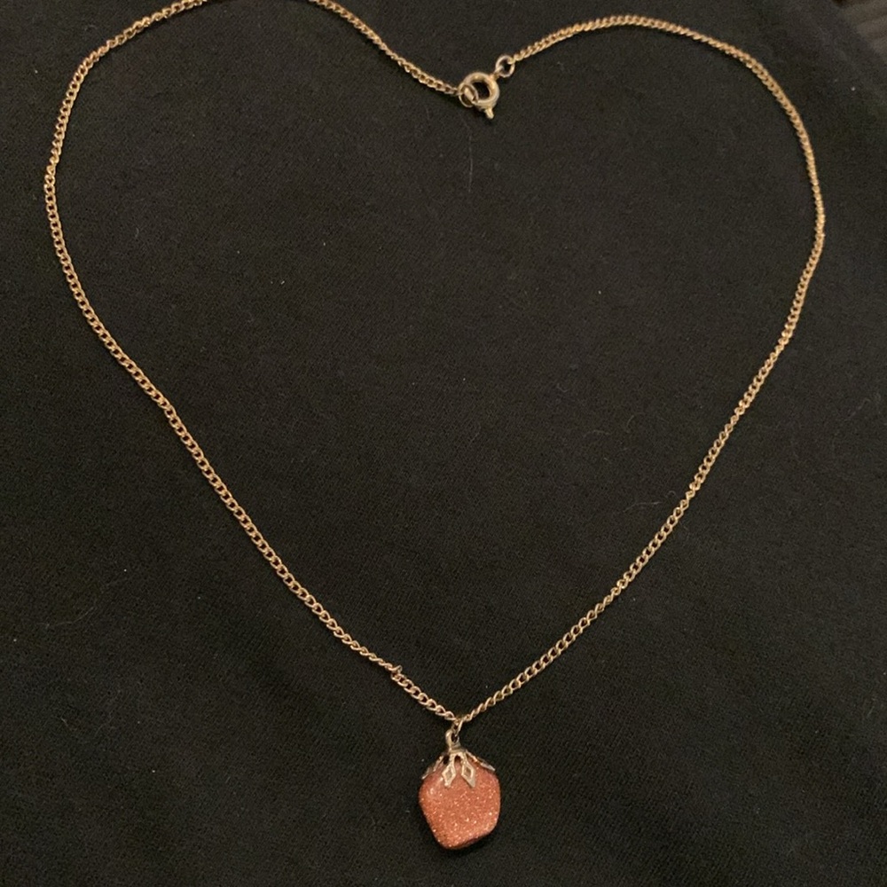 A Sunstone pendant on a Gold toned chain 19” inches. - Picture 5 of 5